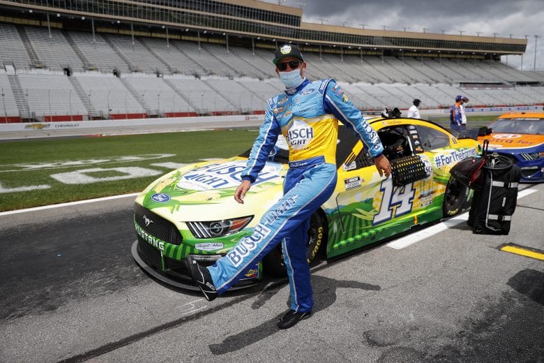 HAMPTON, GEORGIA - JUNE 07: Clint Bowyer, driver of the #14 Busch Light For The Farmers Ford, prepares for the NASCAR Cup Series Folds of Honor QuikTrip 500 at Atlanta Motor Speedway on June 07, 2020 in Hampton, Georgia. (Photo by Chris Graythen/Getty Images) | Getty Images