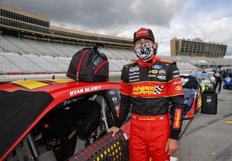 HAMPTON, GEORGIA - JUNE 07: Ryan Blaney, driver of the #12 Advance Auto Parts Ford, waits on the grid prior to the NASCAR Cup Series Folds of Honor QuikTrip 500 at Atlanta Motor Speedway on June 07, 2020 in Hampton, Georgia. (Photo by Chris Graythen/Getty Images) | Getty Images