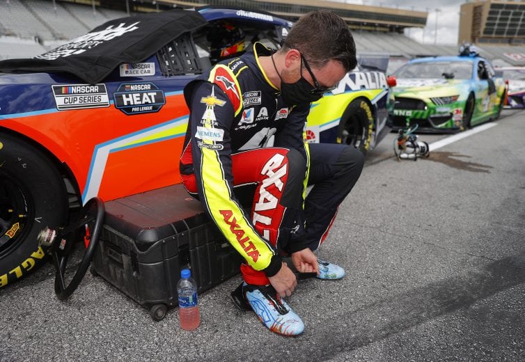 HAMPTON, GEORGIA - JUNE 07: Alex Bowman, driver of the #88 Axalta Chevrolet, prepares for the NASCAR Cup Series Folds of Honor QuikTrip 500 at Atlanta Motor Speedway on June 07, 2020 in Hampton, Georgia. (Photo by Chris Graythen/Getty Images) | Getty Images