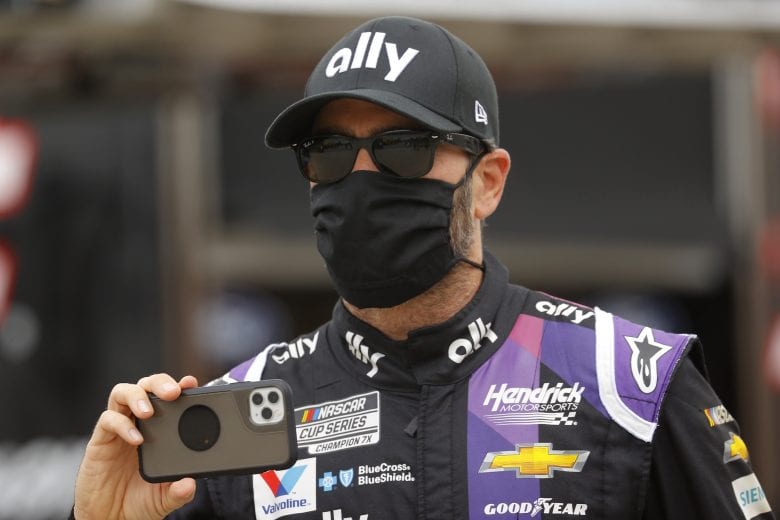 HAMPTON, GEORGIA - JUNE 07: Jimmie Johnson, driver of the #48 Ally Chevrolet, walks the grid prior to the NASCAR Cup Series Folds of Honor QuikTrip 500 at Atlanta Motor Speedway on June 07, 2020 in Hampton, Georgia. (Photo by Chris Graythen/Getty Images) | Getty Images