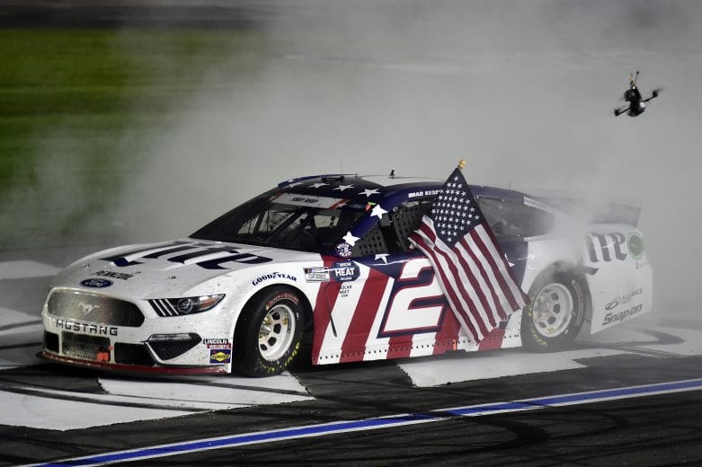 CONCORD, NORTH CAROLINA - MAY 24: Brad Keselowski, driver of the #2 Miller Lite Ford, celebrates with a burnout after winning the NASCAR Cup Series Coca-Cola 600 at Charlotte Motor Speedway on May 24, 2020 in Concord, North Carolina. (Photo by Jared C. Tilton/Getty Images) | Getty Images