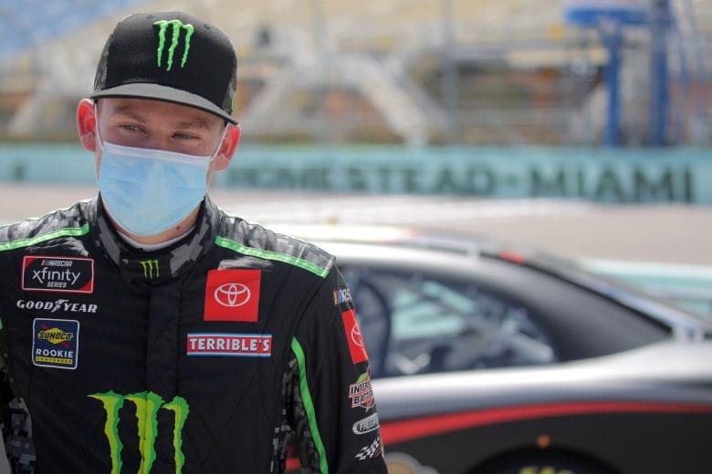 HOMESTEAD, FLORIDA - JUNE 13: Riley Herbst, driver of the #18 Monster Energy Toyota, waits on the grid prior to the NASCAR Xfinity Series Hooters 250 at Homestead-Miami Speedway on June 13, 2020 in Homestead, Florida. (Photo by Chris Graythen/Getty Images) | Getty Images