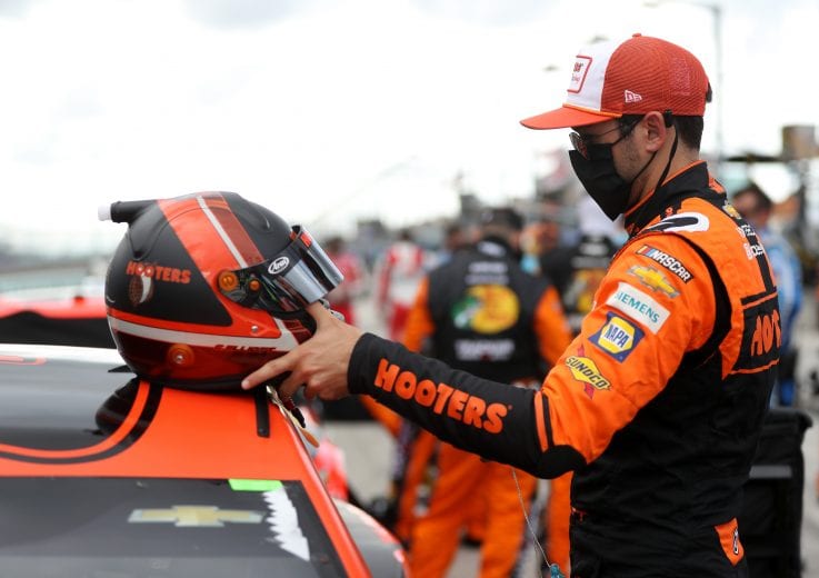 HOMESTEAD, FLORIDA - JUNE 14: Chase Elliott, driver of the #9 Hooters Chevrolet, stands on the grid prior to the NASCAR Cup Series Dixie Vodka 400 at Homestead-Miami Speedway on June 14, 2020 in Homestead, Florida. (Photo by Chris Graythen/Getty Images) | Getty Images