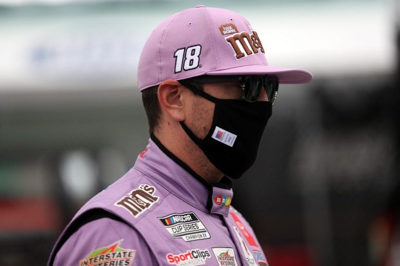 HOMESTEAD, FLORIDA - JUNE 14: Kyle Busch, driver of the #18 M&M's Messages Toyota, walks on the grid prior to the NASCAR Cup Series Dixie Vodka 400 at Homestead-Miami Speedway on June 14, 2020 in Homestead, Florida. (Photo by Chris Graythen/Getty Images) | Getty Images