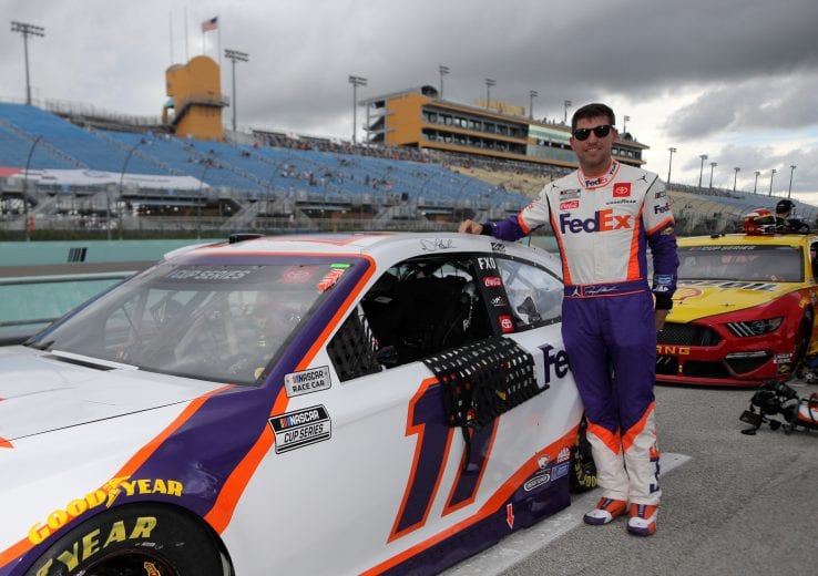 HOMESTEAD, FLORIDA - JUNE 14: Denny Hamlin, driver of the #11 Toyota, stands on the grid prior to the NASCAR Cup Series Dixie Vodka 400 at Homestead-Miami Speedway on June 14, 2020 in Homestead, Florida. (Photo by Chris Graythen/Getty Images) | Getty Images