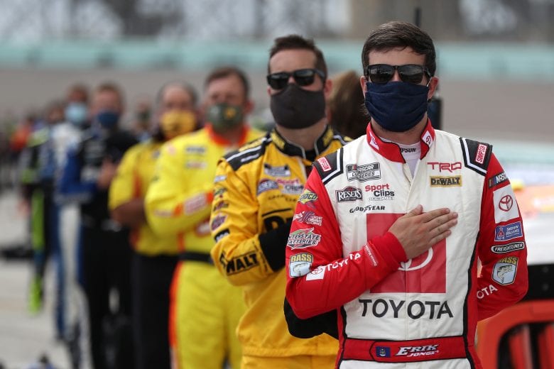 HOMESTEAD, FLORIDA - JUNE 14: Erik Jones, driver of the #20 Toyota Accessories Toyota, stands on the grid prior to the NASCAR Cup Series Dixie Vodka 400 at Homestead-Miami Speedway on June 14, 2020 in Homestead, Florida. (Photo by Chris Graythen/Getty Images) | Getty Images