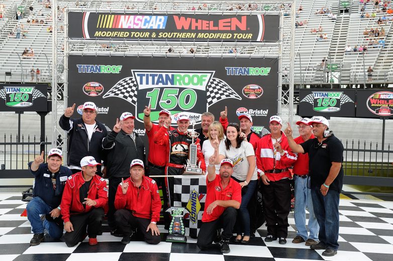 BRISTOL, TN - AUGUST 21:  Mike Stefanik, driver of the #22 Robert B. Our Co./Canto & Sons Paving Ford, celebrates in Victory Lane after winning the TitanRoof 150 at Bristol Motor Speedway on August 21, 2013 in Bristol, Tennessee.  (Photo by John Harrelson/NASCAR via Getty Images)