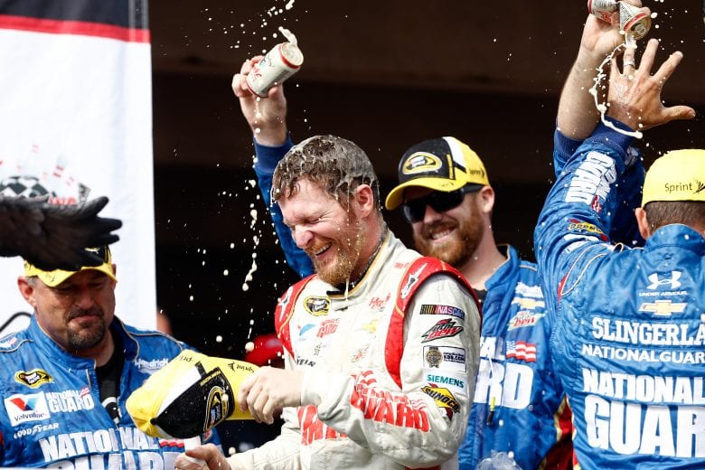 LONG POND, PA - AUGUST 03: Dale Earnhardt Jr., driver of the #88 Michael Baker International Chevrolet, celebrates in Victory Lane after winning the NASCAR Sprint Cup Series GoBowling.com 400 at Pocono Raceway on August 3, 2014 in Long Pond, Pennsylvania. (Photo by Jeff Zelevansky/Getty Images) | Getty Images