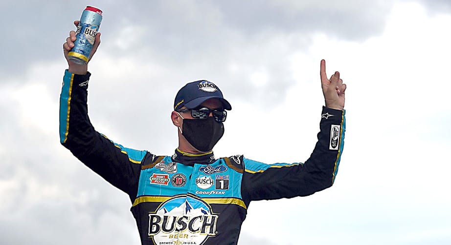 LONG POND, PENNSYLVANIA - JUNE 27: Kevin Harvick, driver of the #4 Busch Head for the Mountains Ford, celebrates in Victory Lane after wining the NASCAR Cup Series Pocono Organics 325 in partnership with Rodale Institute at Pocono Raceway on June 27, 2020 in Long Pond, Pennsylvania. (Photo by Jared C. Tilton/Getty Images) | Getty Images