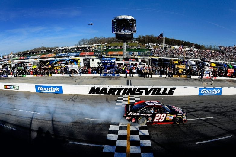 MARTINSVILLE, VA - APRIL 03:  Kevin Harvick, driver of the #29 Budweiser Chevrolet, celebrates on track after winning the NASCAR Sprint Cup Series Goody's Fast Relief 500 at Martinsville Speedway on April 3, 2011 in Martinsville, Virginia.  (Photo by Jared C. Tilton/Getty Images for NASCAR) | Getty Images