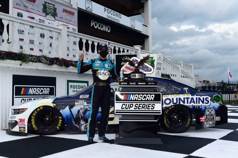 LONG POND, PENNSYLVANIA - JUNE 27: Kevin Harvick, driver of the #4 Busch Head for the Mountains Ford, celebrates in Victory Lane after wining the NASCAR Cup Series Pocono Organics 325 in partnership with Rodale Institute at Pocono Raceway on June 27, 2020 in Long Pond, Pennsylvania. (Photo by Jared C. Tilton/Getty Images) | Getty Images