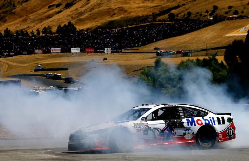 SONOMA, CA - JUNE 25:  Kevin Harvick, driver of the #4 Mobil 1 Ford, celebrates with a burnout after winning the Monster Energy NASCAR Cup Series Toyota/Save Mart 350 at Sonoma Raceway on June 25, 2017 in Sonoma, California.  (Photo by Sean Gardner/Getty Images) | Getty Images