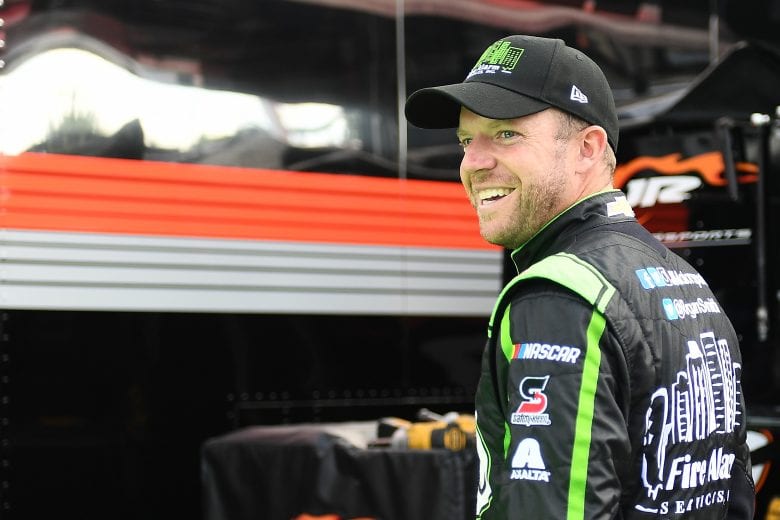 ELKHART LAKE, WISCONSIN - AUGUST 23: Regan Smith, driver of the #8 Fire Alarm Services, Inc. Chevrolet, stands by his car during practice for the NASCAR Xfinity Series CTECH Manufacturing 180 at Road America on August 23, 2019 in Elkhart Lake, Wisconsin. (Photo by Stacy Revere/Getty Images) | Getty Images
