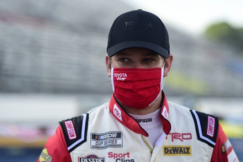 MARTINSVILLE, VIRGINIA - JUNE 10: Erik Jones, driver of the #20 Genuine Parts Toyota, waits on the grid prior to the NASCAR Cup Series Blue-Emu Maximum Pain Relief 500 at Martinsville Speedway on June 10, 2020 in Martinsville, Virginia. (Photo by Jared C. Tilton/Getty Images) | Getty Images