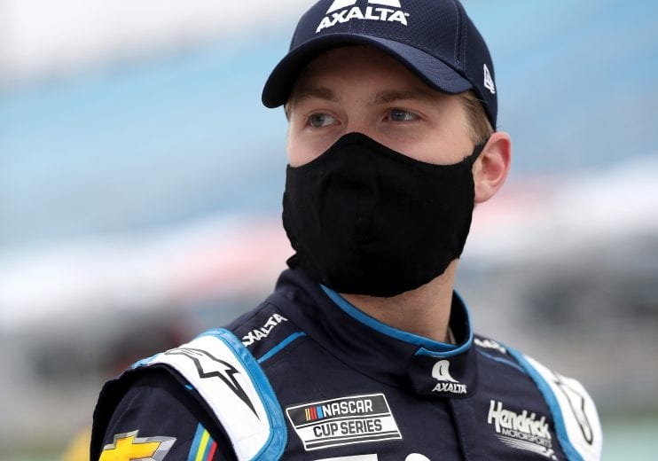 HOMESTEAD, FLORIDA - JUNE 14: William Byron, driver of the #24 Chevrolet, stands on the grid prior to the NASCAR Cup Series Dixie Vodka 400 at Homestead-Miami Speedway on June 14, 2020 in Homestead, Florida. (Photo by Chris Graythen/Getty Images) | Getty Images