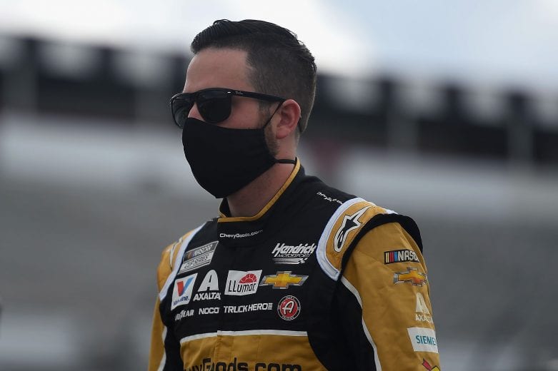 LONG POND, PENNSYLVANIA - JUNE 27: Alex Bowman, driver of the #88 Chevrolet, walks the grid prior to the NASCAR Cup Series Pocono Organics 325 in partnership with Rodale Institute at Pocono Raceway on June 27, 2020 in Long Pond, Pennsylvania. (Photo by Jared C. Tilton/Getty Images) | Getty Images