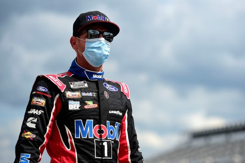 LONG POND, PENNSYLVANIA - JUNE 28: Clint Bowyer, driver of the #14 Mobil 1 Ford, walks on the grid prior to the NASCAR Cup Series Pocono 350 at Pocono Raceway on June 28, 2020 in Long Pond, Pennsylvania. (Photo by Jared C. Tilton/Getty Images) | Getty Images