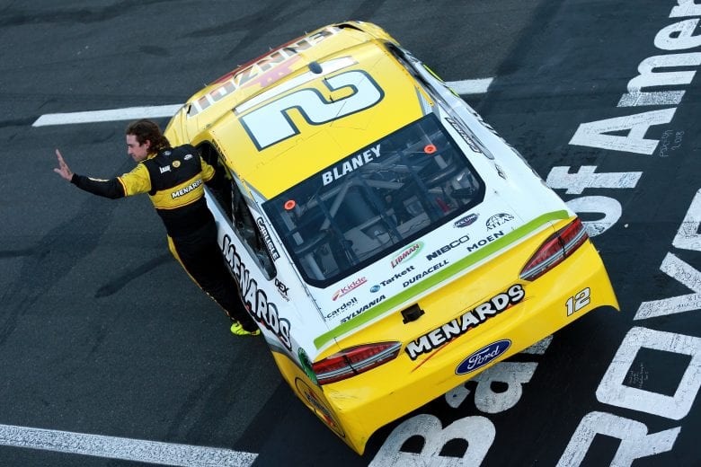 CHARLOTTE, NC - SEPTEMBER 30: Ryan Blaney, driver of the #12 Menards/Pennzoil Ford, celebrates after winning the Monster Energy NASCAR Cup Series Bank of America Roval 400 at Charlotte Motor Speedway on September 30, 2018 in Charlotte, North Carolina. (Photo by Sean Gardner/Getty Images) | Getty Images