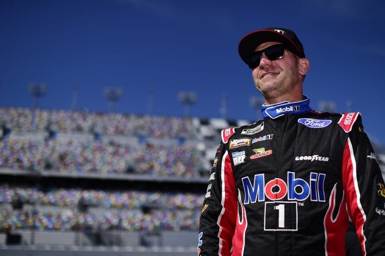 DAYTONA BEACH, FLORIDA - FEBRUARY 09: Clint Bowyer, driver of the #14 Rush/Mobil 1 Ford, stands on the grid during qualifying for the NASCAR Cup Series 62nd Annual Daytona 500 at Daytona International Speedway on February 09, 2020 in Daytona Beach, Florida. (Photo by Jared C. Tilton/Getty Images) | Getty Images