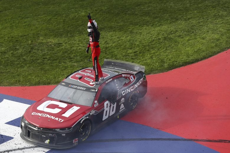 FONTANA, CALIFORNIA - MARCH 01: Alex Bowman, driver of the #88 Cincinnati Chevrolet, celebrates his win in the NASCAR Cup Series Auto Club 400 at Auto Club Speedway on March 01, 2020 in Fontana, California. (Photo by Meg Oliphant/Getty Images) | Getty Images