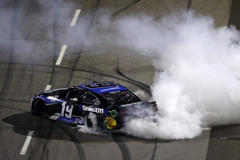 MARTINSVILLE, VIRGINIA - JUNE 10: Martin Truex Jr., driver of the #19 SiriusXM Toyota, celebrates after winning the NASCAR Cup Series Blue-Emu Maximum Pain Relief 500 at Martinsville Speedway on June 10, 2020 in Martinsville, Virginia. (Photo by Rob Carr/Getty Images) | Getty Images