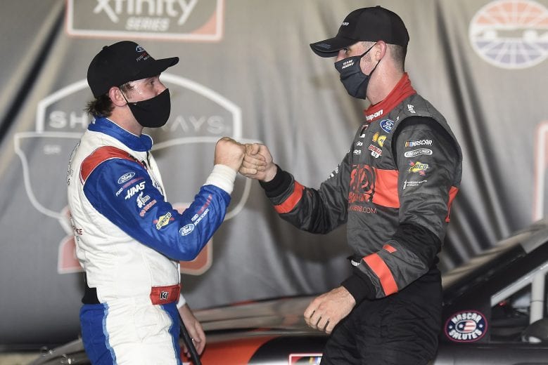 SPARTA, KENTUCKY - JULY 09: Austin Cindric, driver of the #22 Snap-On Ford, celebrates in Victory Lane with Chase Briscoe, driver of the #98 Ford Performance Racing School Ford, after winning the NASCAR Xfinity Series Shady Rays 200 at Kentucky Speedway on July 09, 2020 in Sparta, Kentucky. (Photo by Jared C. Tilton/Getty Images) | Getty Images