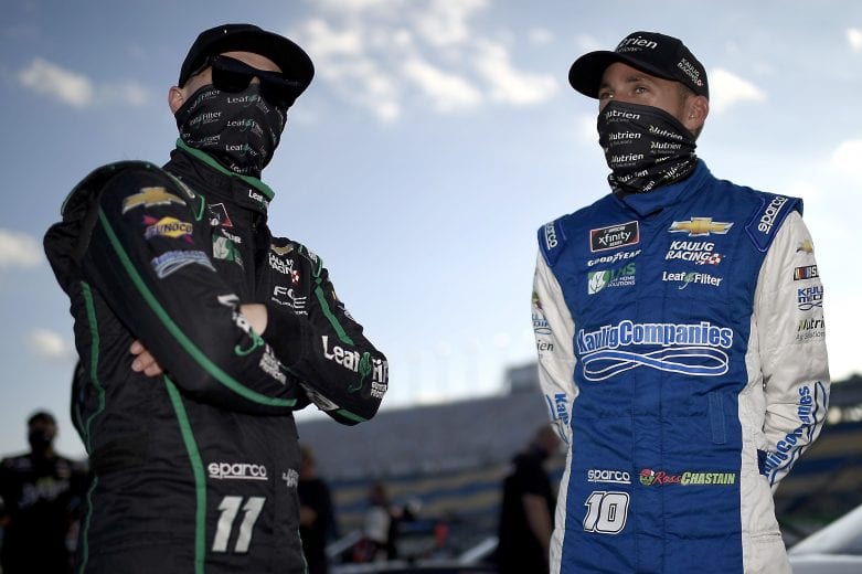 SPARTA, KENTUCKY - JULY 10: Justin Haley, driver of the #11 LeafFilter Gutter Protection Chevrolet, and Ross Chastain, driver of the #10 Chevy Accessories Chevrolet, talk on the grid prior to the NASCAR Xfinity Series Alsco 300 at Kentucky Speedway on July 10, 2020 in Sparta, Kentucky. (Photo by Jared C. Tilton/Getty Images) | Getty Images