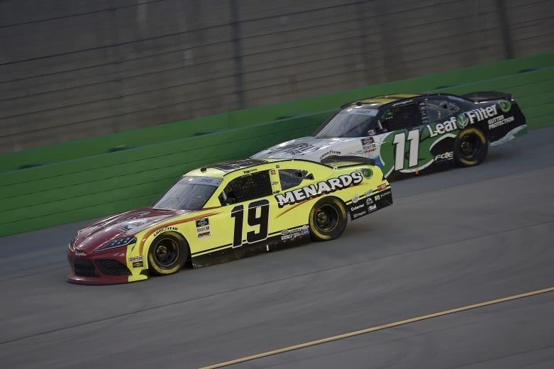 SPARTA, KENTUCKY - JULY 10: Brandon Jones, driver of the #19 Menards/Atlas Toyota, leads Justin Haley, driver of the #11 LeafFilter Gutter Protection Chevrolet, during the NASCAR Xfinity Series Alsco 300 at Kentucky Speedway on July 10, 2020 in Sparta, Kentucky. (Photo by Jared C. Tilton/Getty Images) | Getty Images