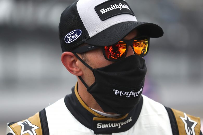 INDIANAPOLIS, INDIANA - JULY 05:  Aric Almirola, driver of the #10 Smithfield Ford, waits on the grid prior to the NASCAR Cup Series Big Machine Hand Sanitizer 400 Powered by Big Machine Records at Indianapolis Motor Speedway on July 05, 2020 in Indianapolis, Indiana. (Photo by Chris Graythen/Getty Images) | Getty Images