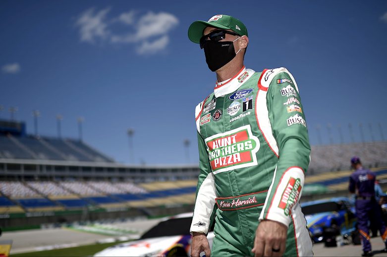 SPARTA, KENTUCKY - JULY 12: Kevin Harvick, driver of the #4 Hunt Brothers Pizza Ford, walks the grid prior to the NASCAR Cup Series Quaker State 400 Presented by Walmart at Kentucky Speedway on July 12, 2020 in Sparta, Kentucky. (Photo by Jared C. Tilton/Getty Images) | Getty Images