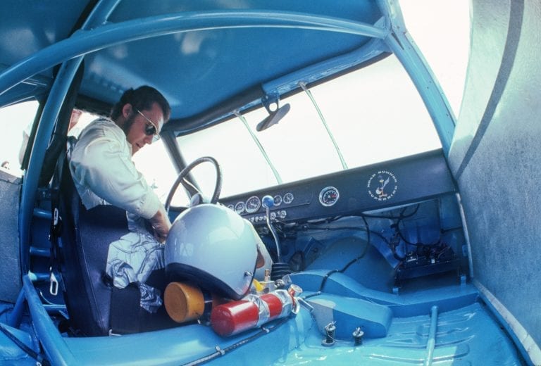 BROOKLYN, MI - AUGUST 16: Richard Petty sits in his #43 STP Plymouth Road Runner NASCAR racer before qualifying for the Yankee 400 Race on August 16, 1970 in Brooklyn, Michigan. (Photo by Alvis Upitis/Getty Images)