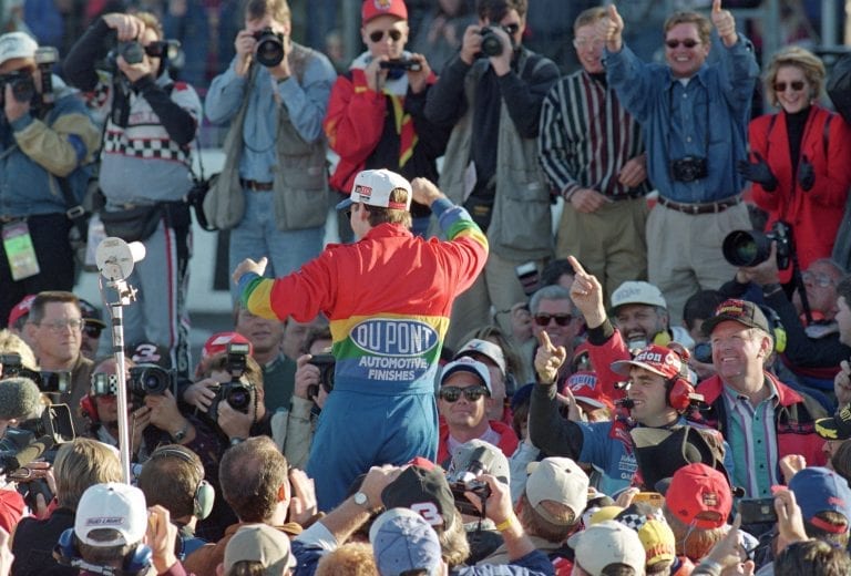 ATLANTA - NOVEMBER 12:  Jeff Gordon of DuPont Chevrolet celebrates winning the Winston Cup championship in the NASCAR NAPA 500 at the Atlantic Motor Speedway on November 12, 1995 in Atlanta, Georgia.  (Photo by David Taylor/Getty Images) | Getty Images