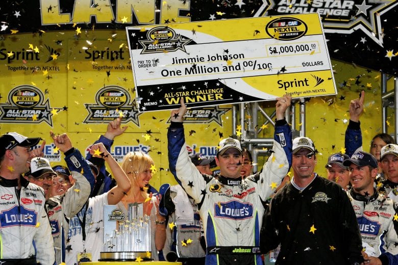 CONCORD, NC - MAY 20:  Jimmie Johnson, driver of the #48 Lowe's Chevrolet, celebrates after winning the NASCAR Nextel Cup Series All-Star Challenge on May 20, 2006 at Lowe's Motor Speedway in Concord, North Carolina.  (Photo by Streeter Lecka/Getty Images) | Getty Images