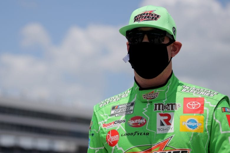 FORT WORTH, TEXAS - JULY 19: Kyle Busch, driver of the #18 Interstate Batteries Toyota, walks on the grid prior to the NASCAR Cup Series O'Reilly Auto Parts 500 at Texas Motor Speedway on July 19, 2020 in Fort Worth, Texas. (Photo by Chris Graythen/Getty Images) | Getty Images