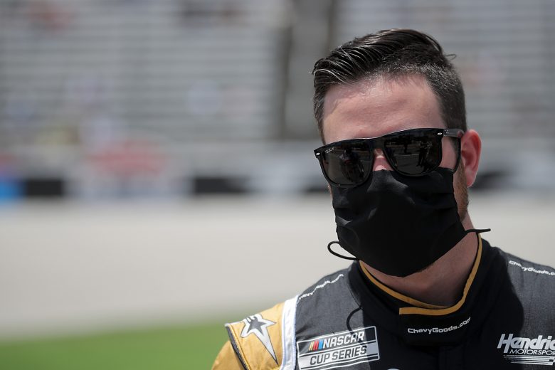 FORT WORTH, TEXAS - JULY 19: Alex Bowman, driver of the #88 ChevyGoods.com/Adam's Polishes Chevrolet, stands on the grid prior to the NASCAR Cup Series O'Reilly Auto Parts 500 at Texas Motor Speedway on July 19, 2020 in Fort Worth, Texas. (Photo by Chris Graythen/Getty Images) | Getty Images