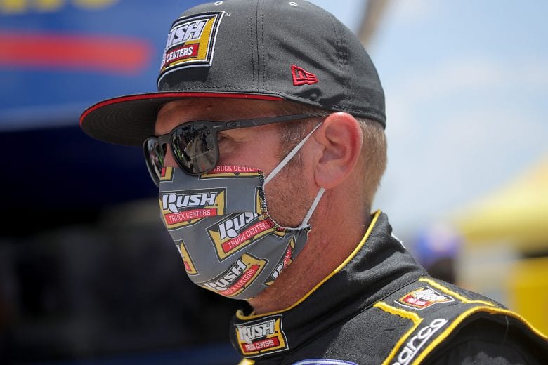 FORT WORTH, TEXAS - JULY 19: Clint Bowyer, driver of the #14 Rush Truck Centers Ford, walks on the grid prior to the NASCAR Cup Series O'Reilly Auto Parts 500 at Texas Motor Speedway on July 19, 2020 in Fort Worth, Texas. (Photo by Chris Graythen/Getty Images) | Getty Images