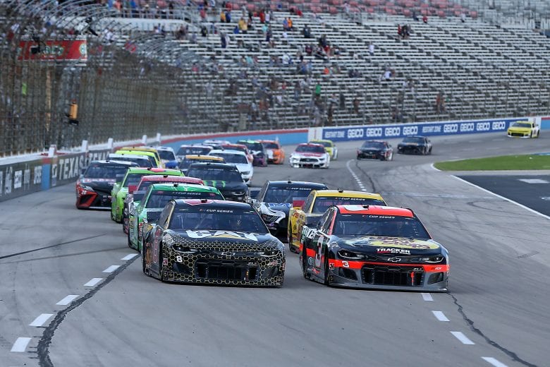 FORT WORTH, TEXAS - JULY 19: Austin Dillon, driver of the #3 Bass Pro Shops Chevrolet, and Tyler Reddick, driver of the #8 Cat Oil & Gas Chevrolet, lead the field to a restart during the NASCAR Cup Series O'Reilly Auto Parts 500 at Texas Motor Speedway on July 19, 2020 in Fort Worth, Texas. (Photo by Brian Lawdermilk/Getty Images) | Getty Images