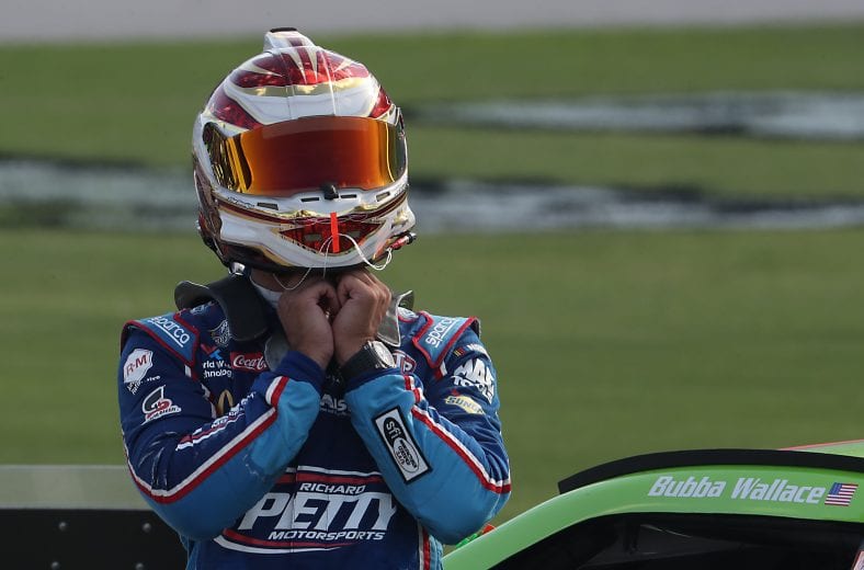 FORT WORTH, TEXAS - JULY 19: Bubba Wallace, driver of the #43 Cash App Chevrolet, stands on the grid following the NASCAR Cup Series O'Reilly Auto Parts 500 at Texas Motor Speedway on July 19, 2020 in Fort Worth, Texas. (Photo by Chris Graythen/Getty Images) | Getty Images