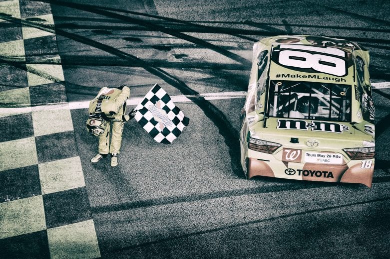 KANSAS CITY, KS - MAY 07: (EDITOR'S NOTE: Image was processed using digital filters.)  Kyle Busch, driver of the #18 M&M's Red Nose Toyocta, celebrates after winning the NASCAR Sprint Cup Series Go Bowling 400 at Kansas Speedway on May 7, 2016 in Kansas City, Kansas.  (Photo by Robert Laberge/NASCAR via Getty Images)