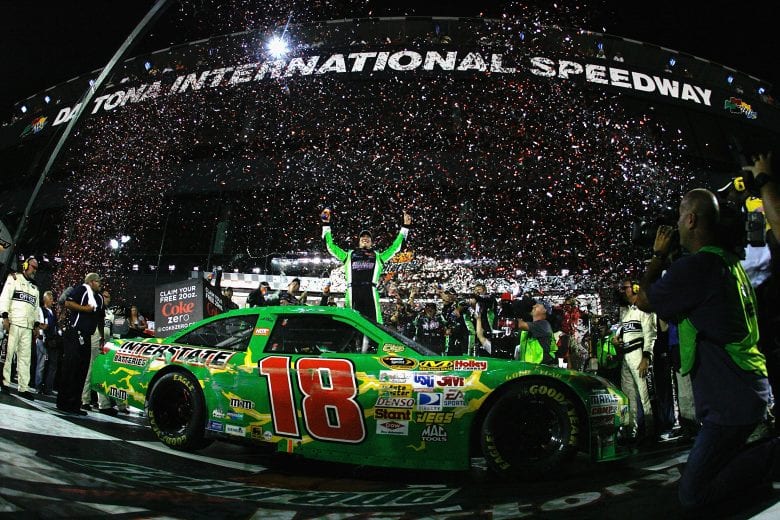 DAYTONA BEACH, FL - JULY 05:  Kyle Busch, driver of the #18 Interstate Batteries Toyota, celebrates in victory lane after winning the NASCAR Sprint Cup Series Coke Zero 400 at Daytona International Speedway on July 5, 2008 in Daytona Beach, Florida.  (Photo by Jason Smith/Getty Images for NASCAR) | Getty Images