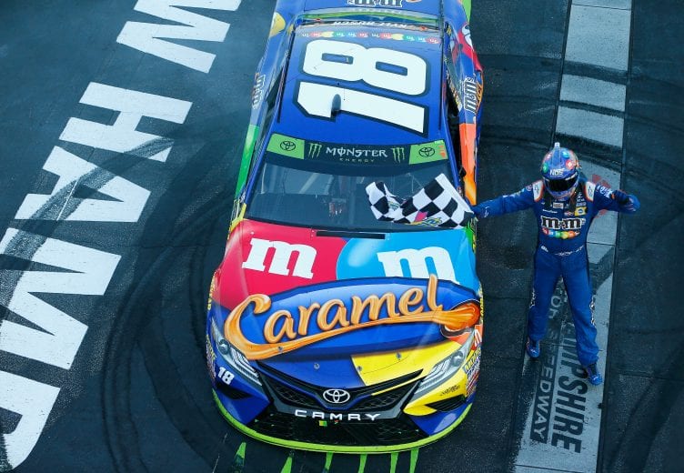 LOUDON, NH - SEPTEMBER 24:  Kyle Busch, driver of the #18 M&M's Caramel Toyota, celebrates winning the Monster Energy NASCAR Cup Series ISM Connect 300 at New Hampshire Motor Speedway on September 24, 2017 in Loudon, New Hampshire.  (Photo by Jonathan Ferrey/Getty Images) | Getty Images