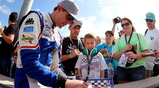 Travis Pastrana pulls NASCAR helmet back off the wall, to race Gander Trucks at Kansas