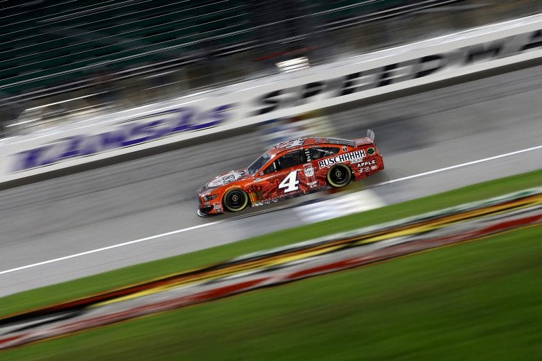 KANSAS CITY, KANSAS - JULY 23: Kevin Harvick, driver of the #4 Busch Light Apple Ford, drives during the NASCAR Cup Series Super Start Batteries 400 Presented by O'Reilly Auto Parts at Kansas Speedway on July 23, 2020 in Kansas City, Kansas. (Photo by Jamie Squire/Getty Images) | Getty Images
