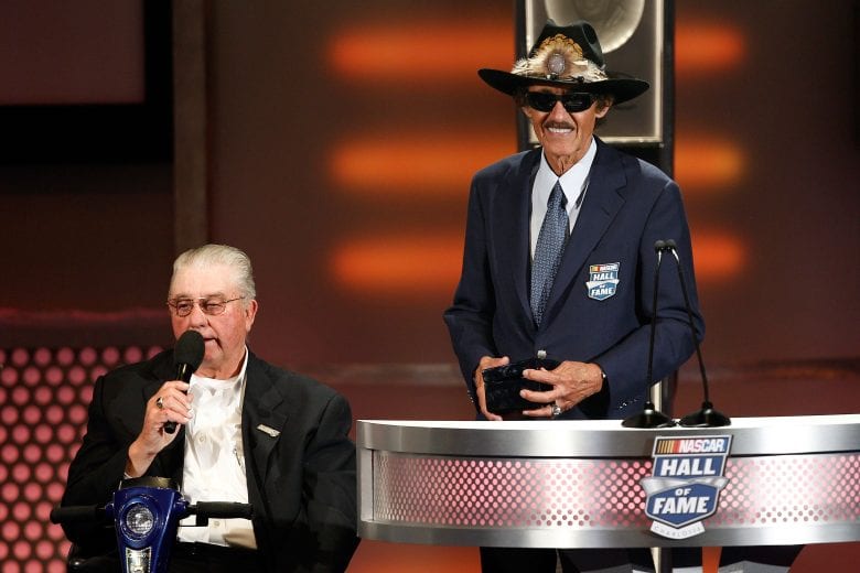 CHARLOTTE, NC - MAY 23: (L-R) Maurice Petty and Richard Petty speak on stage during the 2011 NASCAR Hall of Fame induction ceremonies at the Charlotte Convention Center on May 23, 2011 in Charlotte, North Carolina. (Photo by John Harrelson/Getty Images for NASCAR) | Getty Images
