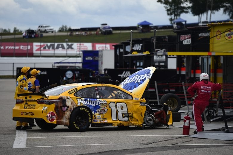LOUDON, NEW HAMPSHIRE - AUGUST 02:  Crew members work on the #18 Pedigree Toyota, driven by Kyle Busch, after an on-track incident during the NASCAR Cup Series Foxwoods Resort Casino 301 at New Hampshire Motor Speedway on August 02, 2020 in Loudon, New Hampshire. (Photo by Jared C. Tilton/Getty Images) | Getty Images