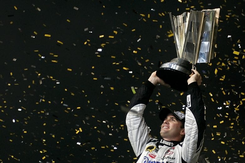 HOMESTEAD, FL - NOVEMBER 16: Jimmie Johnson, driver of the #48 Lowe's/Kobalt Tools Chevrolet, celebrates winning the 2008 NASCAR Sprint Cup Series Championship after finishing 15th during the NASCAR Sprint Cup Series Ford 400 at Homestead-Miami Speedway on November 16, 2008 in Homestead, Florida. (Photo by Jason Smith/Getty Images for NASCAR) | Getty Images