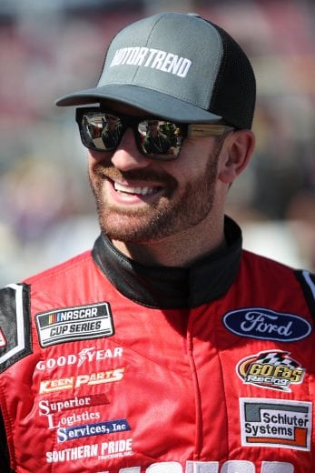 AVONDALE, ARIZONA - MARCH 07: Corey LaJoie, driver of the #32 Motor Trend Ford, stands on the grid during qualifying for the NASCAR Cup Series FanShield 500 at Phoenix Raceway on March 07, 2020 in Avondale, Arizona. (Photo by Chris Graythen/Getty Images) | Getty Images