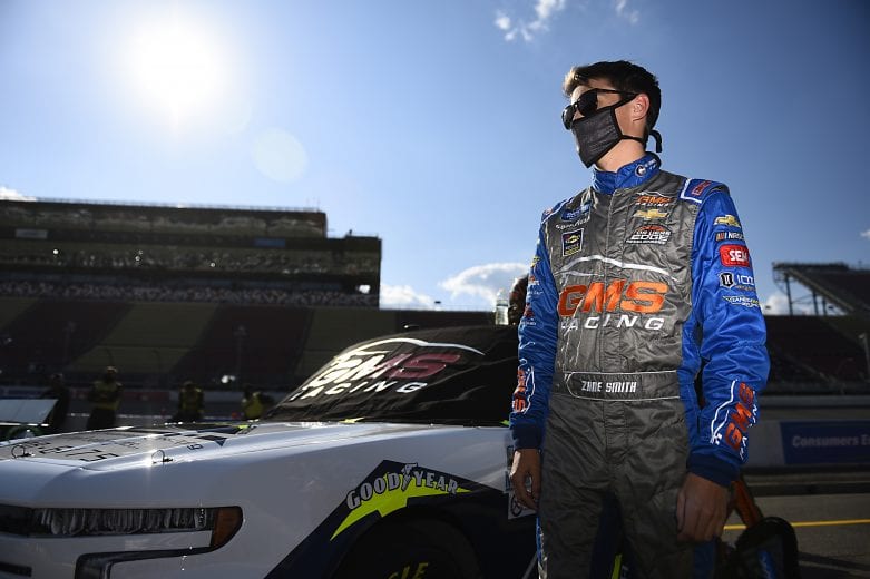 BROOKLYN, MICHIGAN - AUGUST 07: Zane Smith, driver of the #21 Bay Mountain Aire Chevrolet, waits on the grid prior to the NASCAR Gander RV & Outdoors Truck Series Henry Ford Health System 200 at Michigan International Speedway on August 07, 2020 in Brooklyn, Michigan. (Photo by Jared C. Tilton/Getty Images) | Getty Images