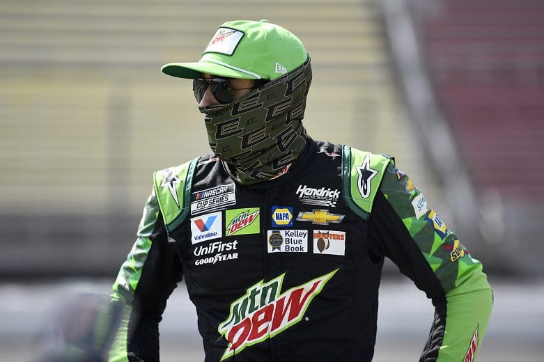 BROOKLYN, MICHIGAN - AUGUST 09: Chase Elliott, driver of the #9 Mountain Dew Chevrolet, walks the grid prior to the NASCAR Cup Series Consumers Energy 400 at Michigan International Speedway on August 09, 2020 in Brooklyn, Michigan. (Photo by Jared C. Tilton/Getty Images) | Getty Images
