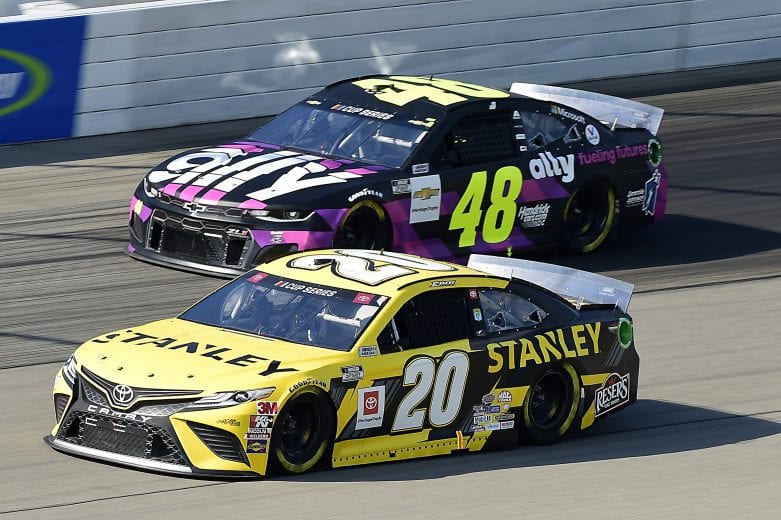 BROOKLYN, MICHIGAN - AUGUST 09: Erik Jones, driver of the #20 STANLEY Toyota, races Jimmie Johnson, driver of the #48 Ally Fueling Futures Chevrolet, during the NASCAR Cup Series Consumers Energy 400 at Michigan International Speedway on August 09, 2020 in Brooklyn, Michigan. (Photo by Jared C. Tilton/Getty Images) | Getty Images